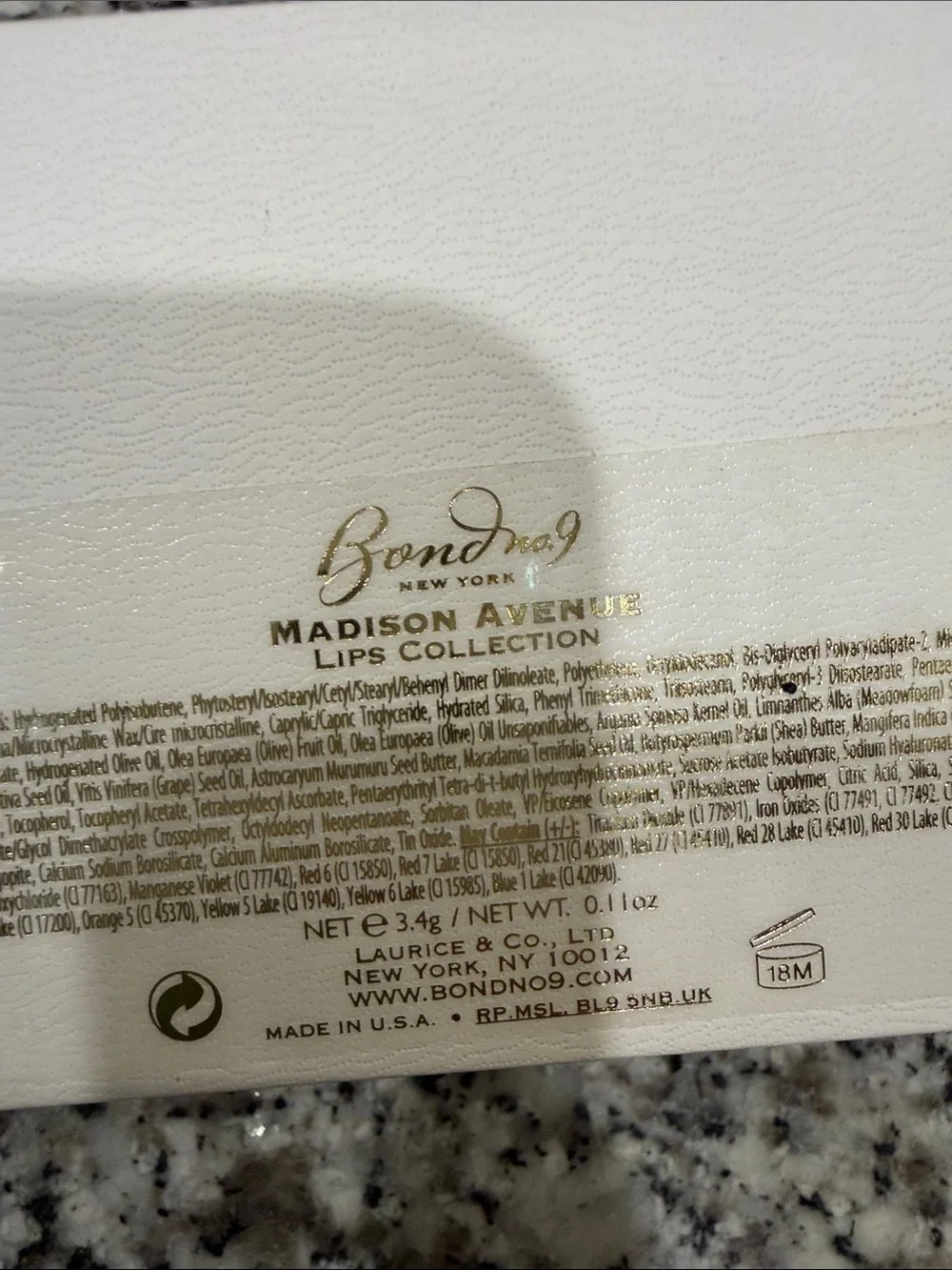 Bond No. 9 New York White Card with Gold Logo and Coral Trim